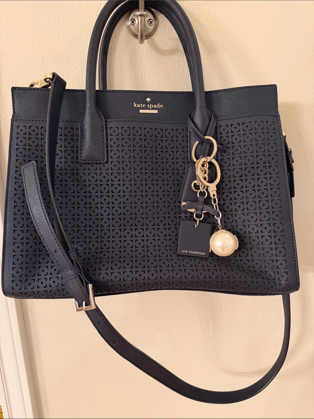 kate spade Black Perforated Leather Satchel with Gold Charm